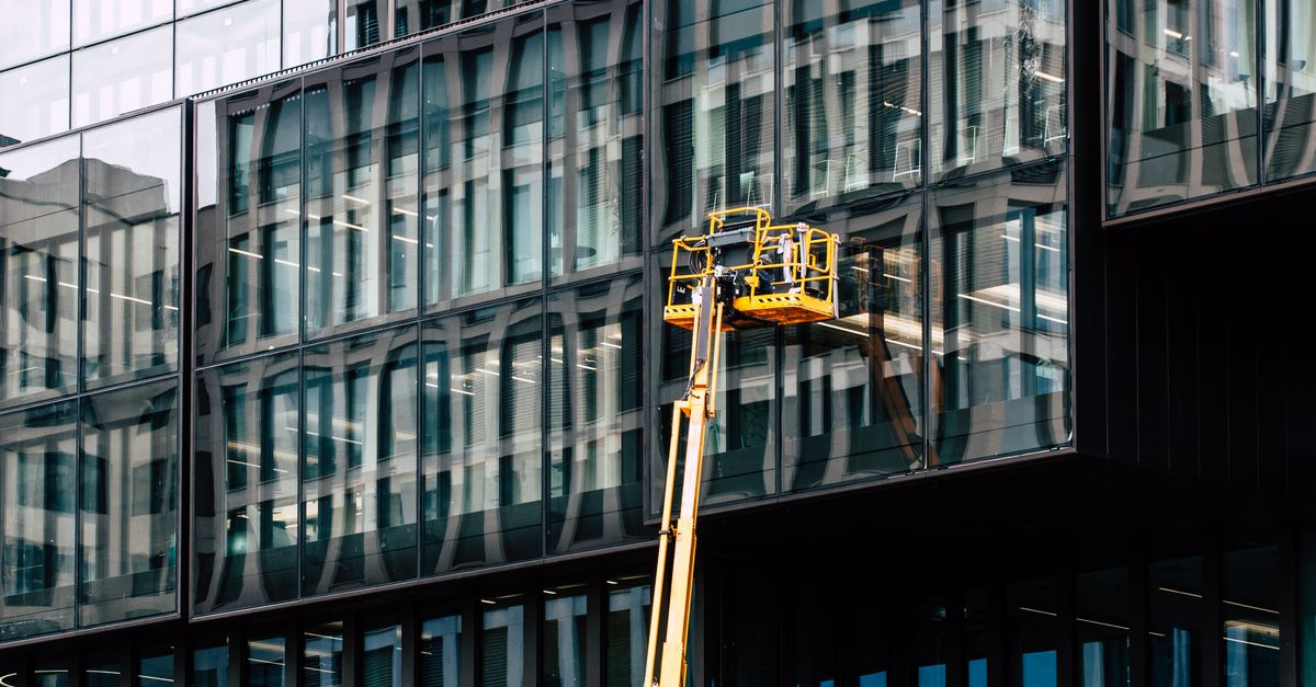 Mastering the Traditional Ladder Technique for Commercial Window Cleaning